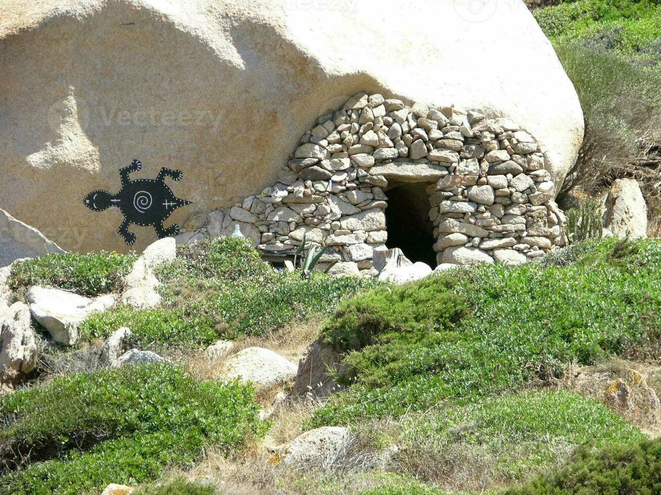 a rock with a hole in it photo