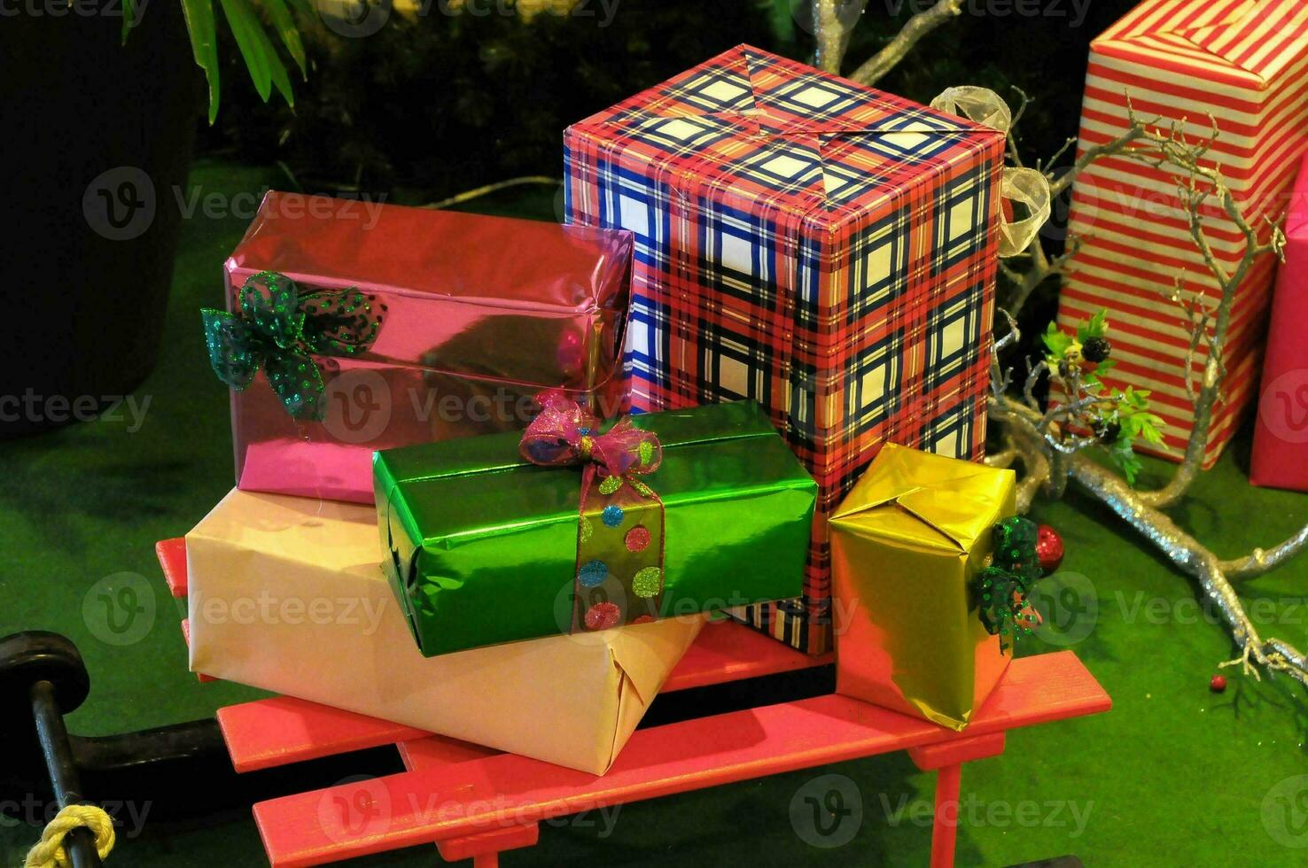 a small toy cart with presents on it photo