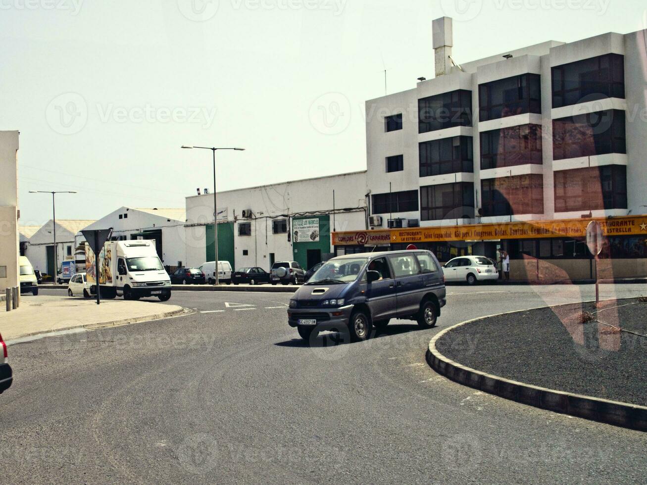 scenery with the city's characteristic white buildings from the Spanish island of Lanzarote on a warm summer day photo