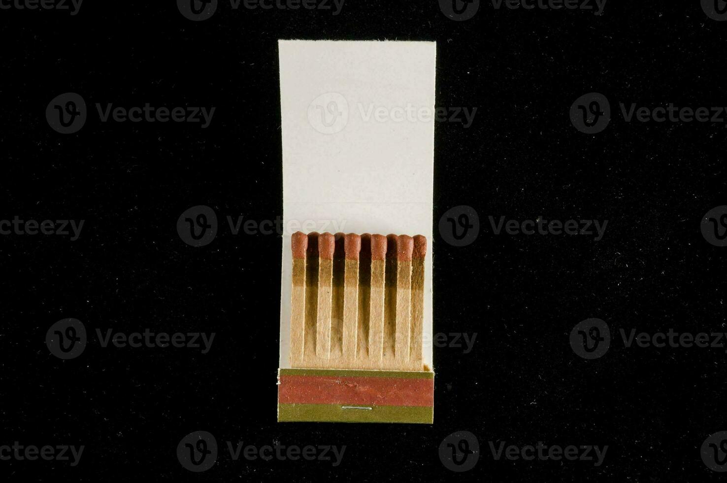 a pack of matches in a white box photo