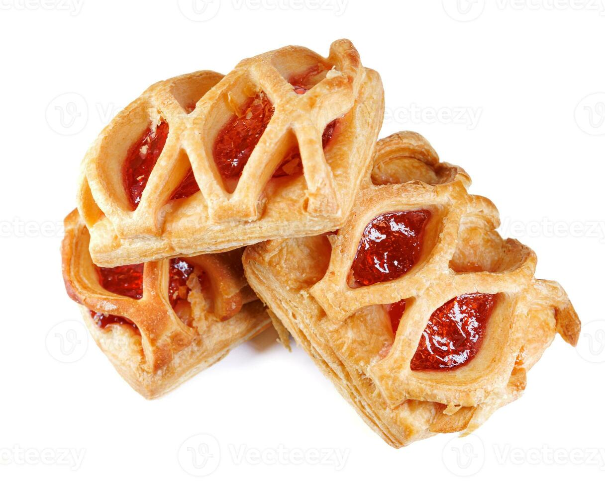 Puff pastry pastry with lingonberry jam isolated on a white background. Cookies with lingonberry jam. photo