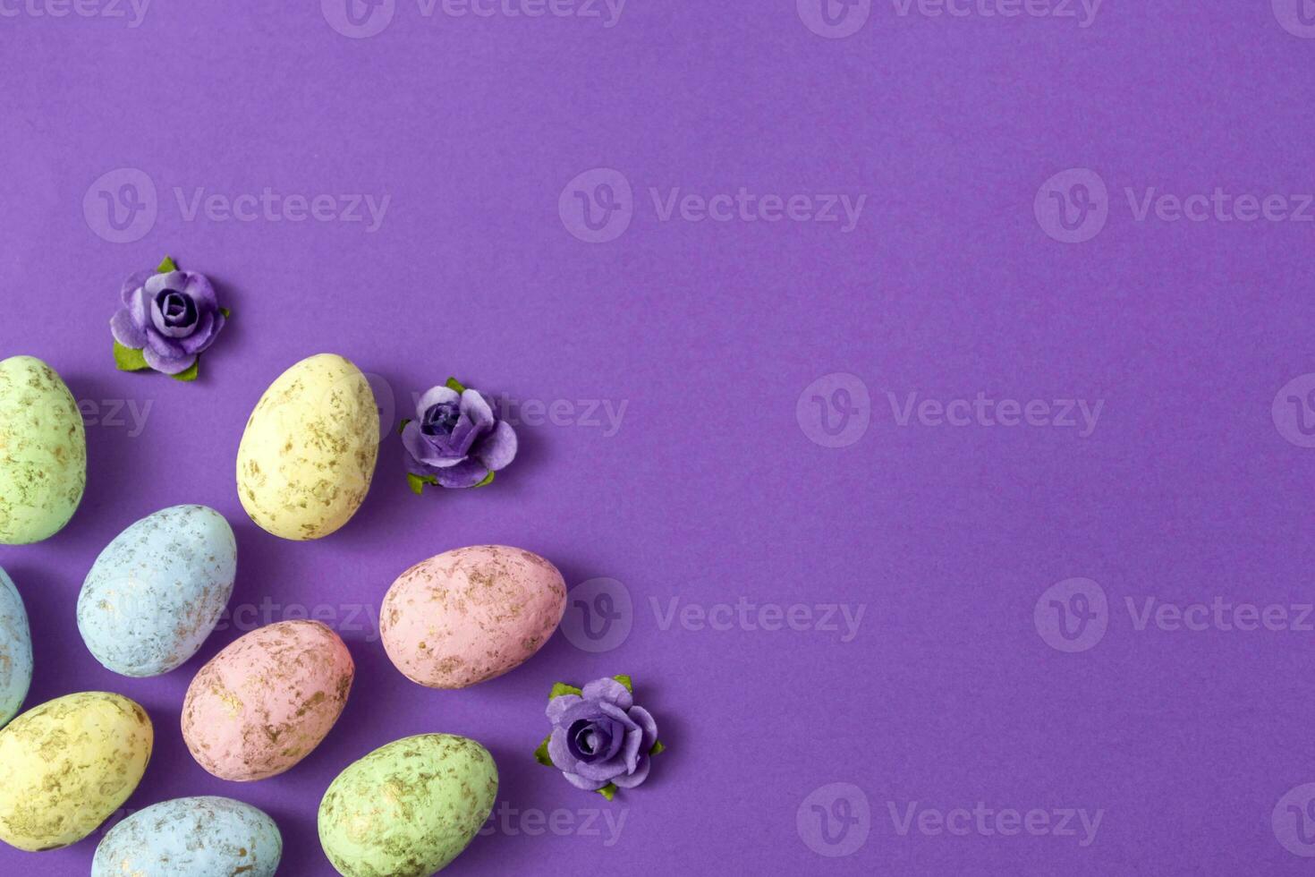 Easter eggs on a colored background. Festive banner with copyspace photo