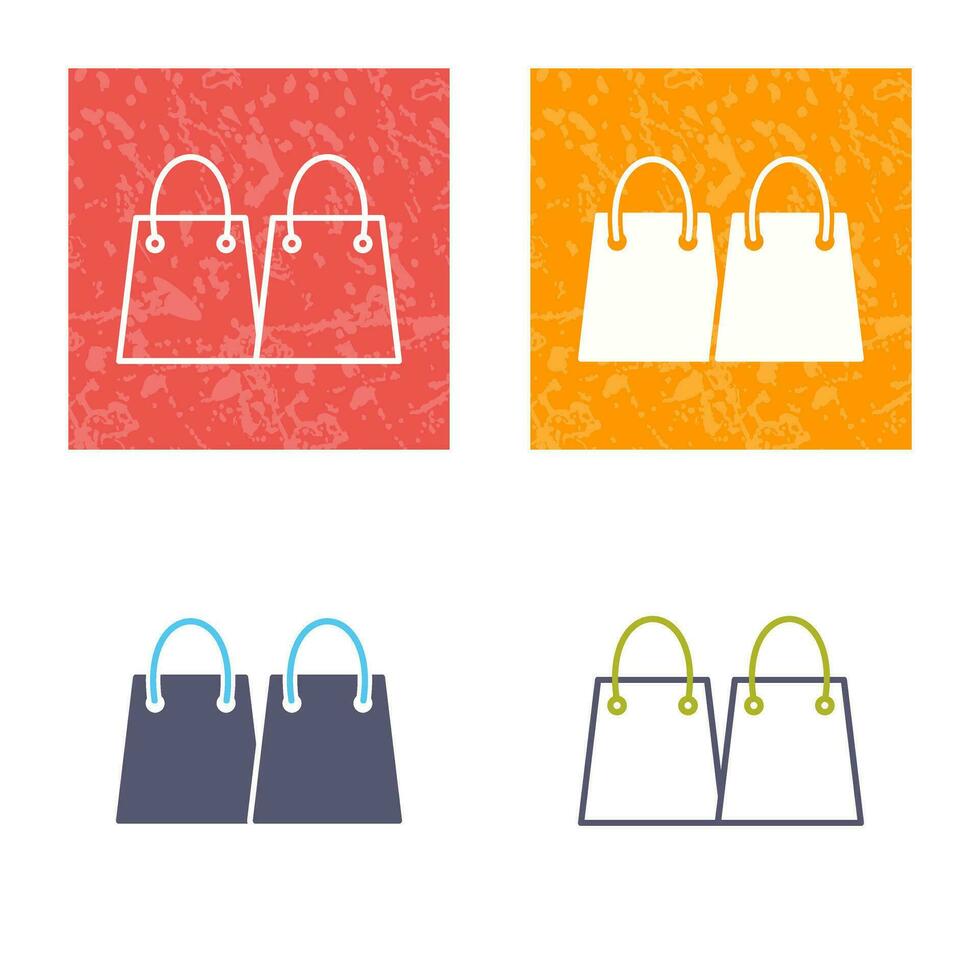 icono de vector de bolsas de compras únicas