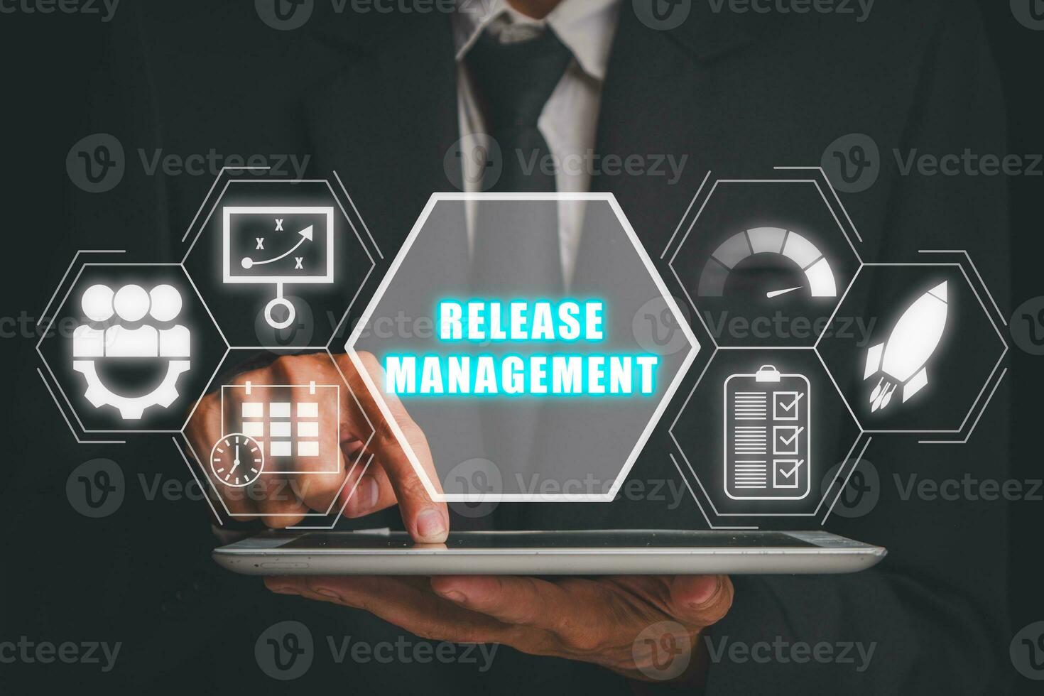Release management concept, Businessman using tablet with release management icon on virtual screen. photo