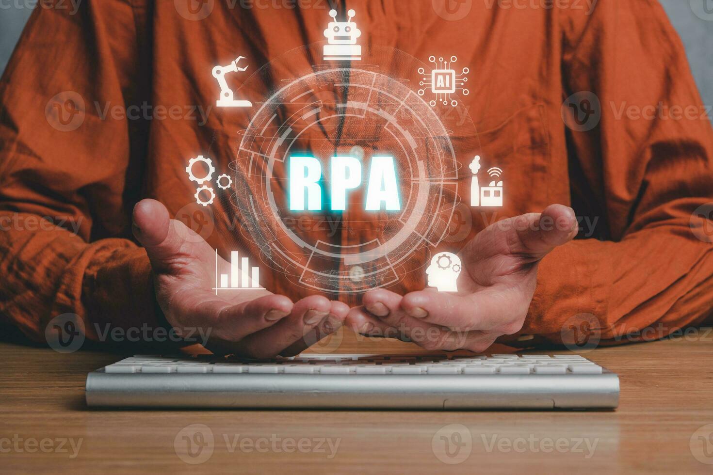 RPA Robotic Process Automation Innovation technology concept, Person hand holding VR screen RPA icon on office desk background. photo