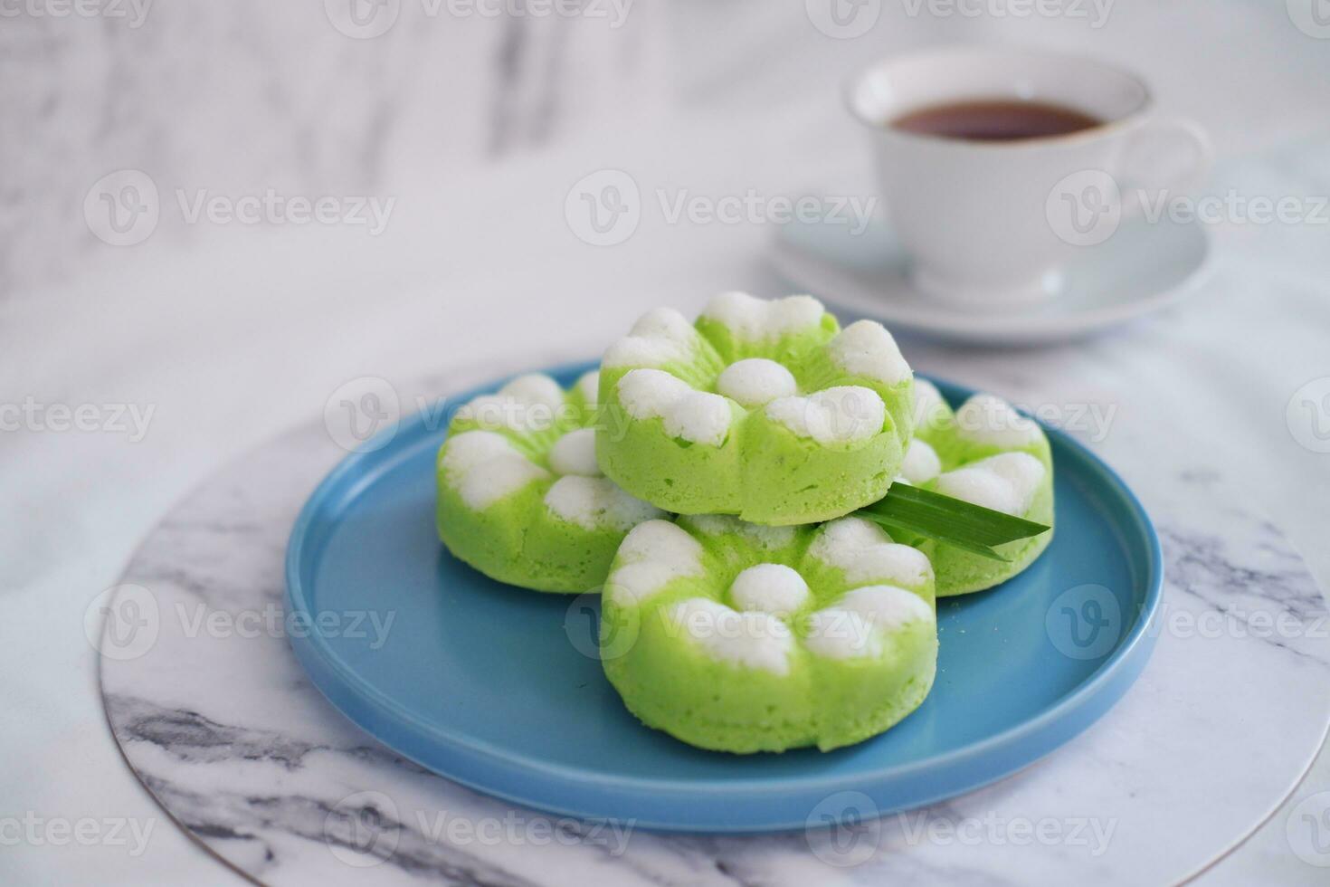 Kue Putu Ayu, a traditional Indonesian snack made from rice flour, pandan leaves, grated coconut then steamed. photo