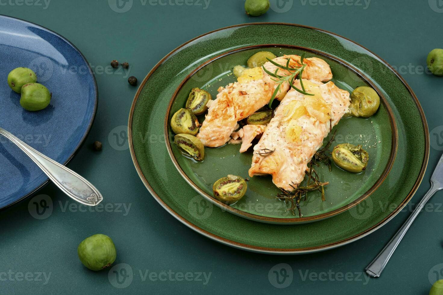 Roasted salmon fillet steak with mini kiwi. photo