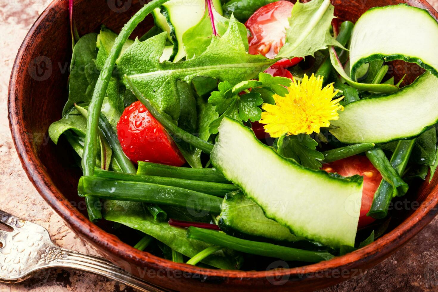 Spring salad with dandelions photo