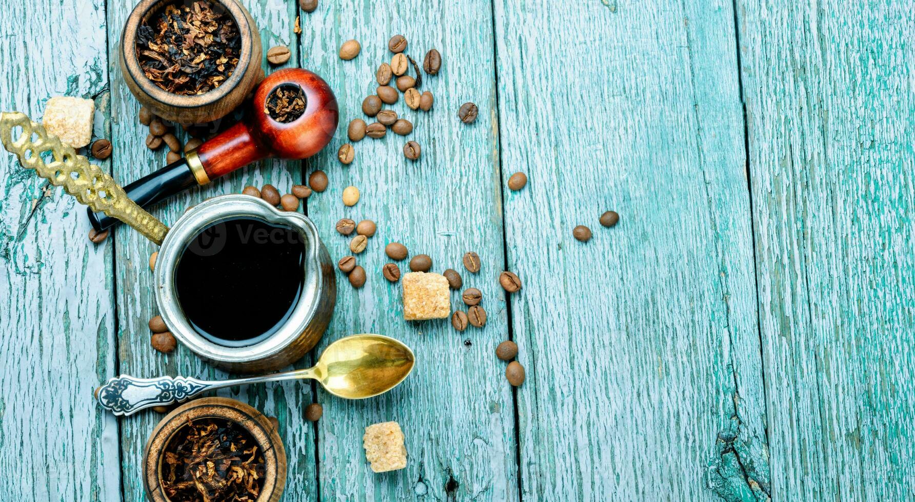 Smoking pipe and coffee photo