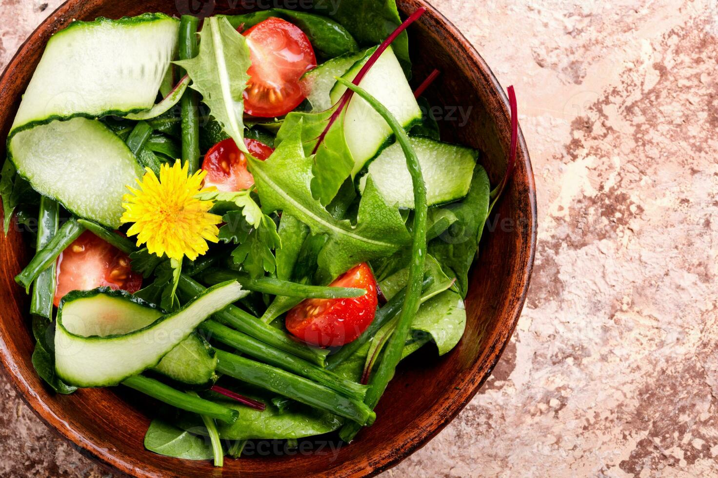 Spring salad with dandelions photo