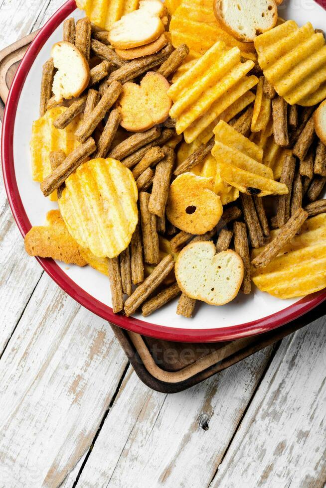 Salty snacks,potato chips photo