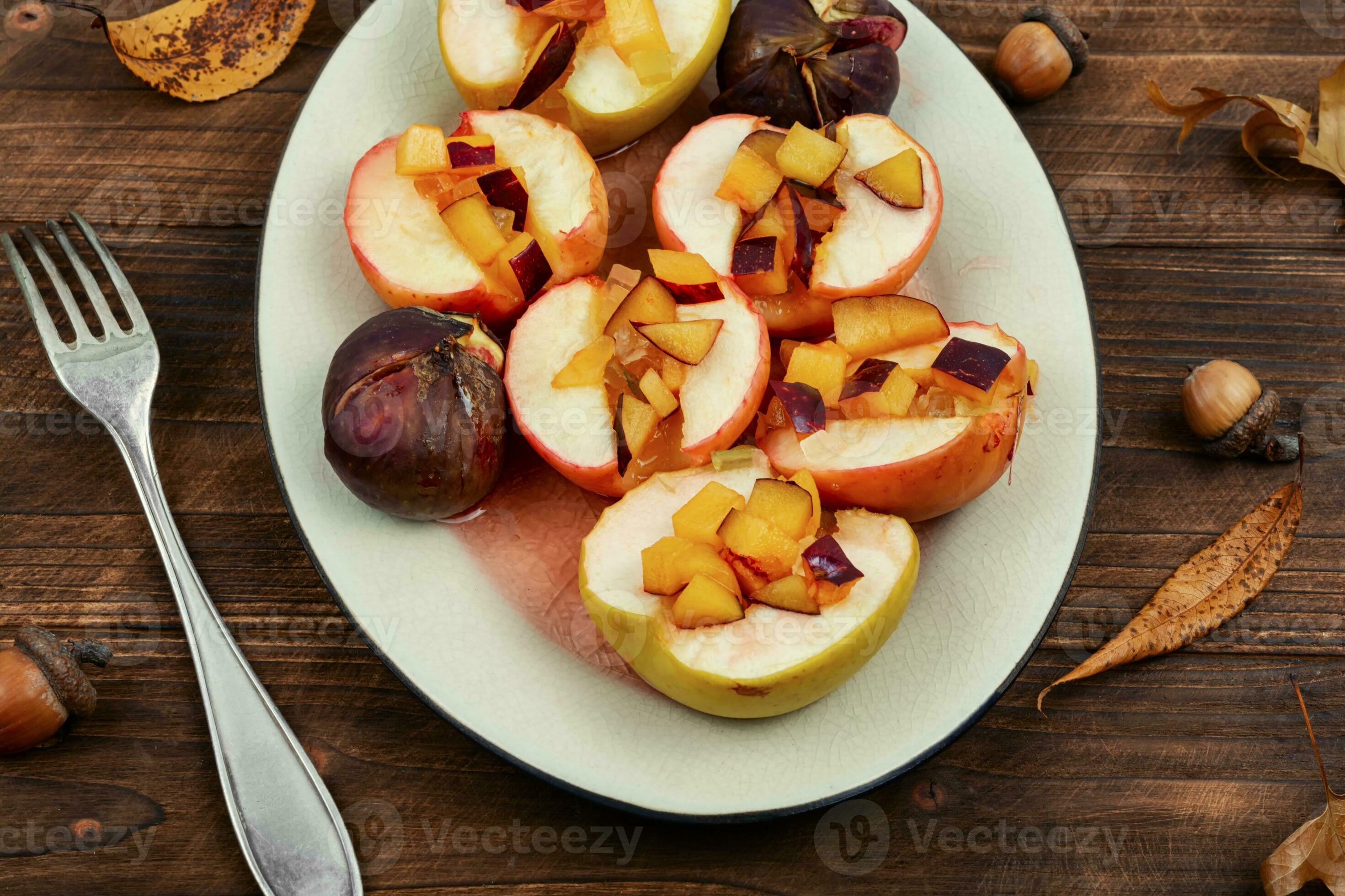 Baked caramelized apples and figs. 33102786 Stock Photo at Vecteezy