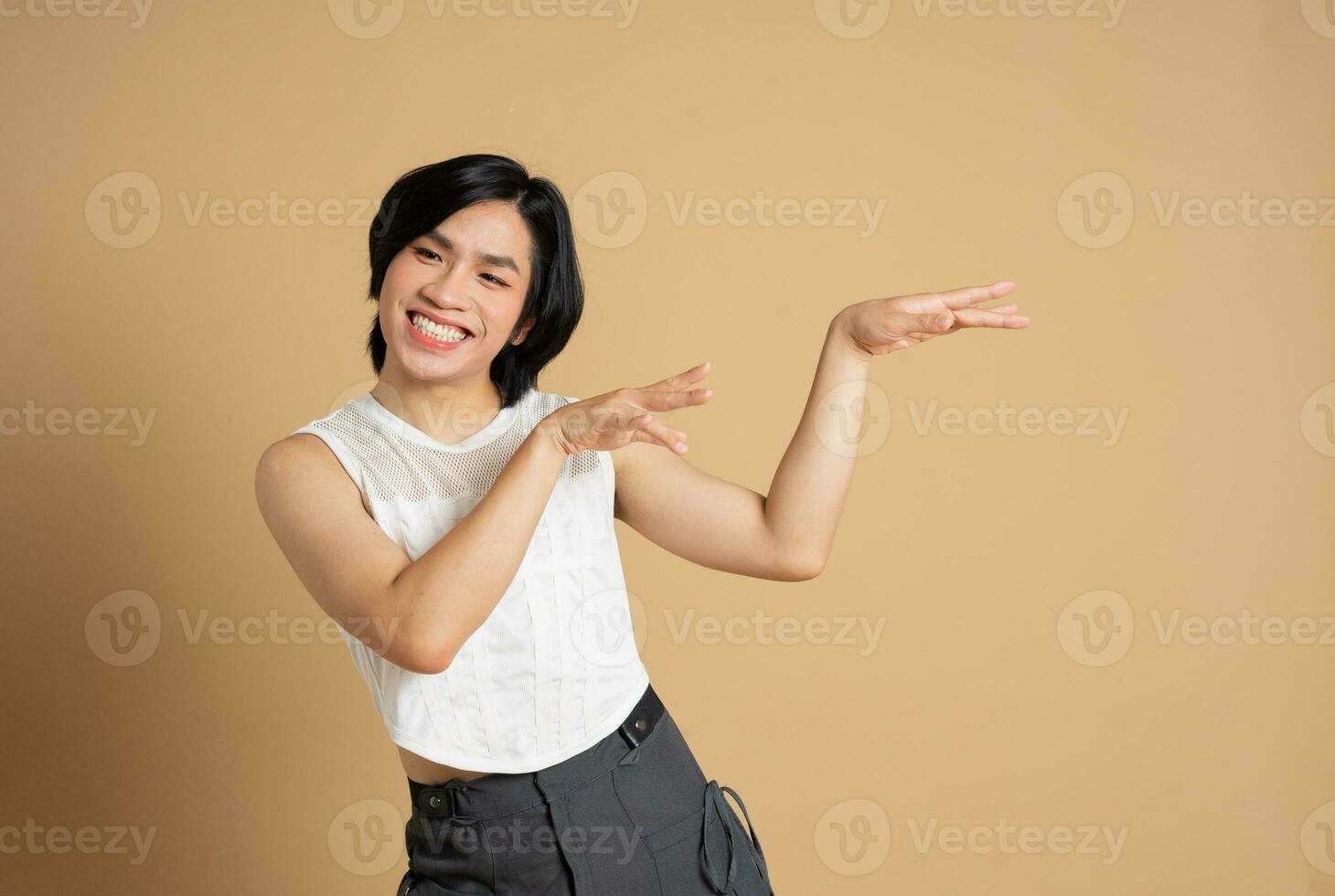 Portrait of gay man confidently posing on background photo
