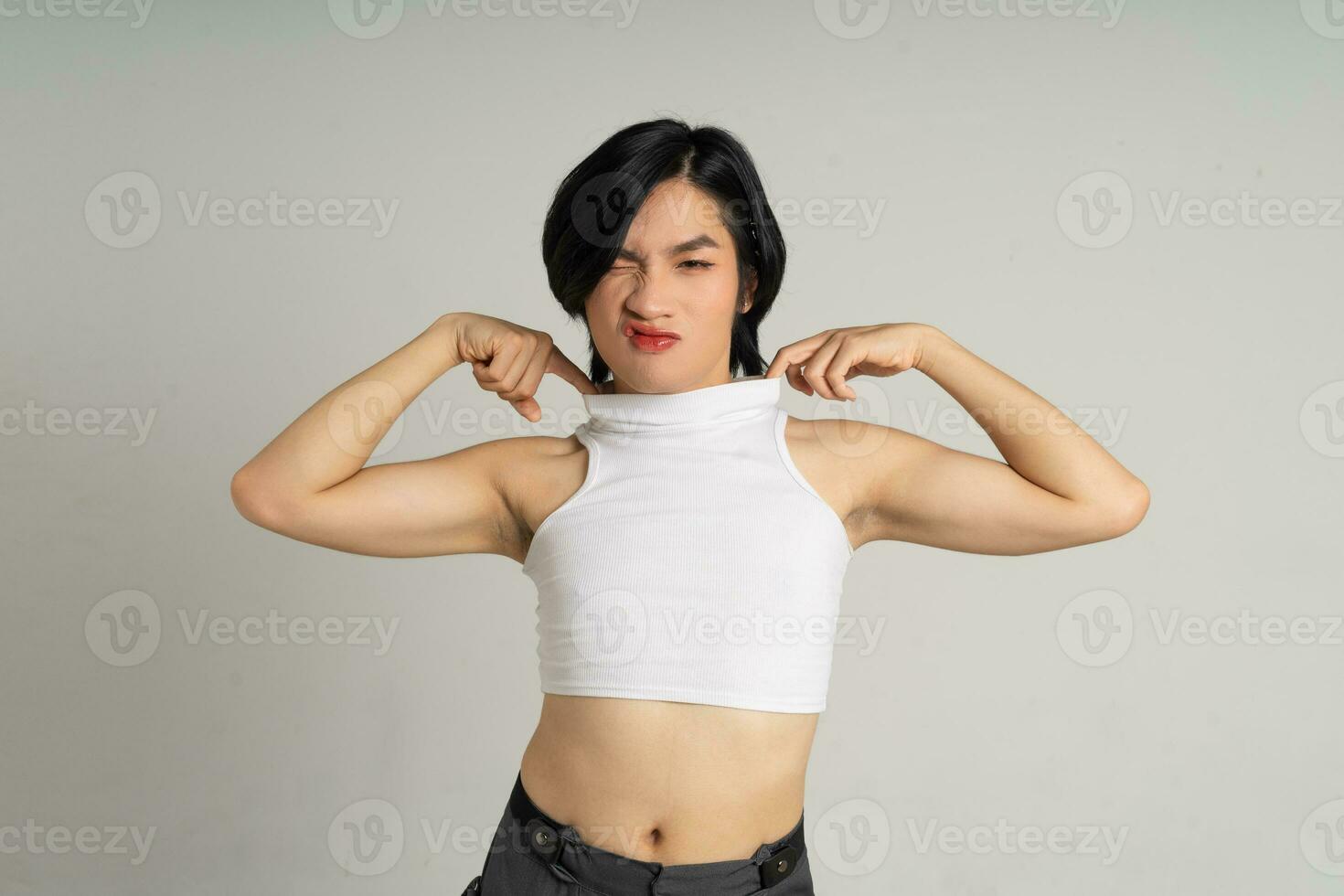 Portrait of gay man confidently posing on background photo