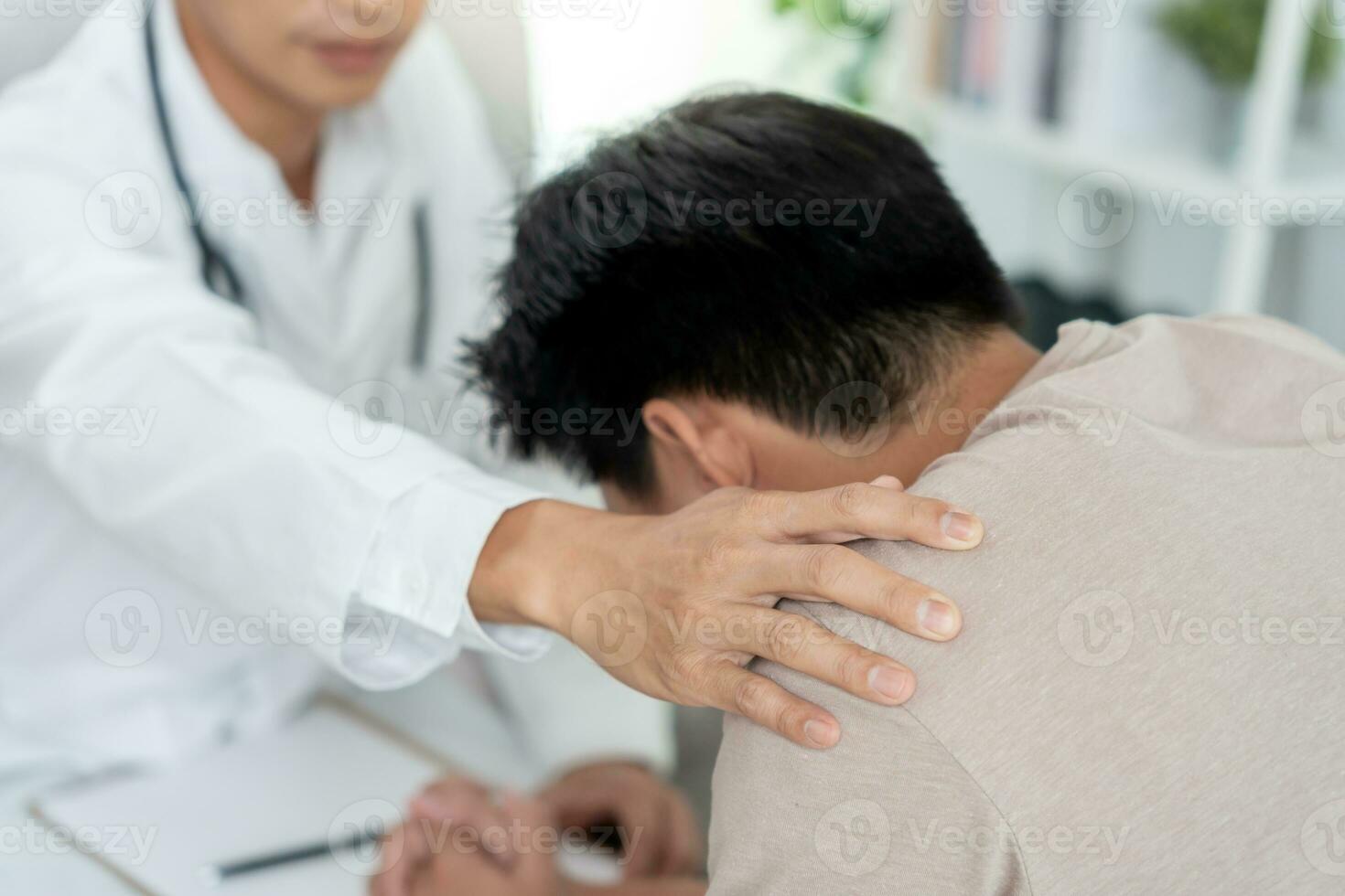 psychiatrist holds shoulders while discussing life and family issues. doctor encourages and empathy woman suffers depression. psychological, save divorce, Hand in hand together, trust, care photo