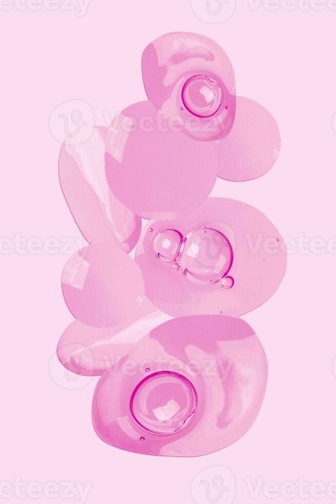 a pink background with many bubbles on it photo