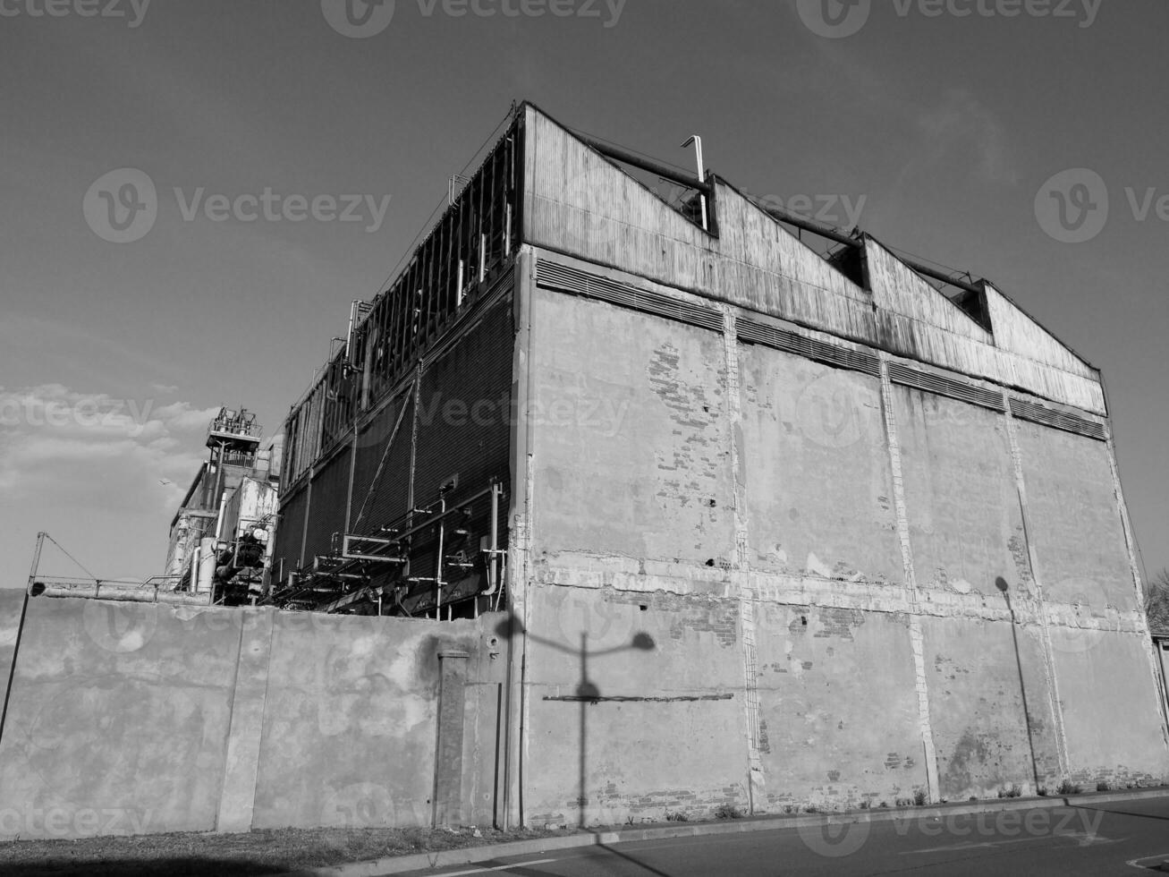 abandoned factory ruins in black and white photo