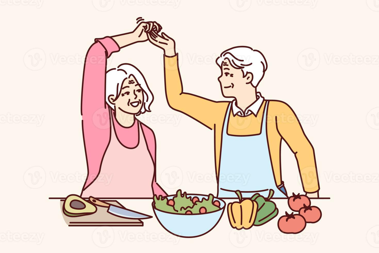 Elderly couple of vegans cooks dinner and dances together, calling for healthy lifestyle photo
