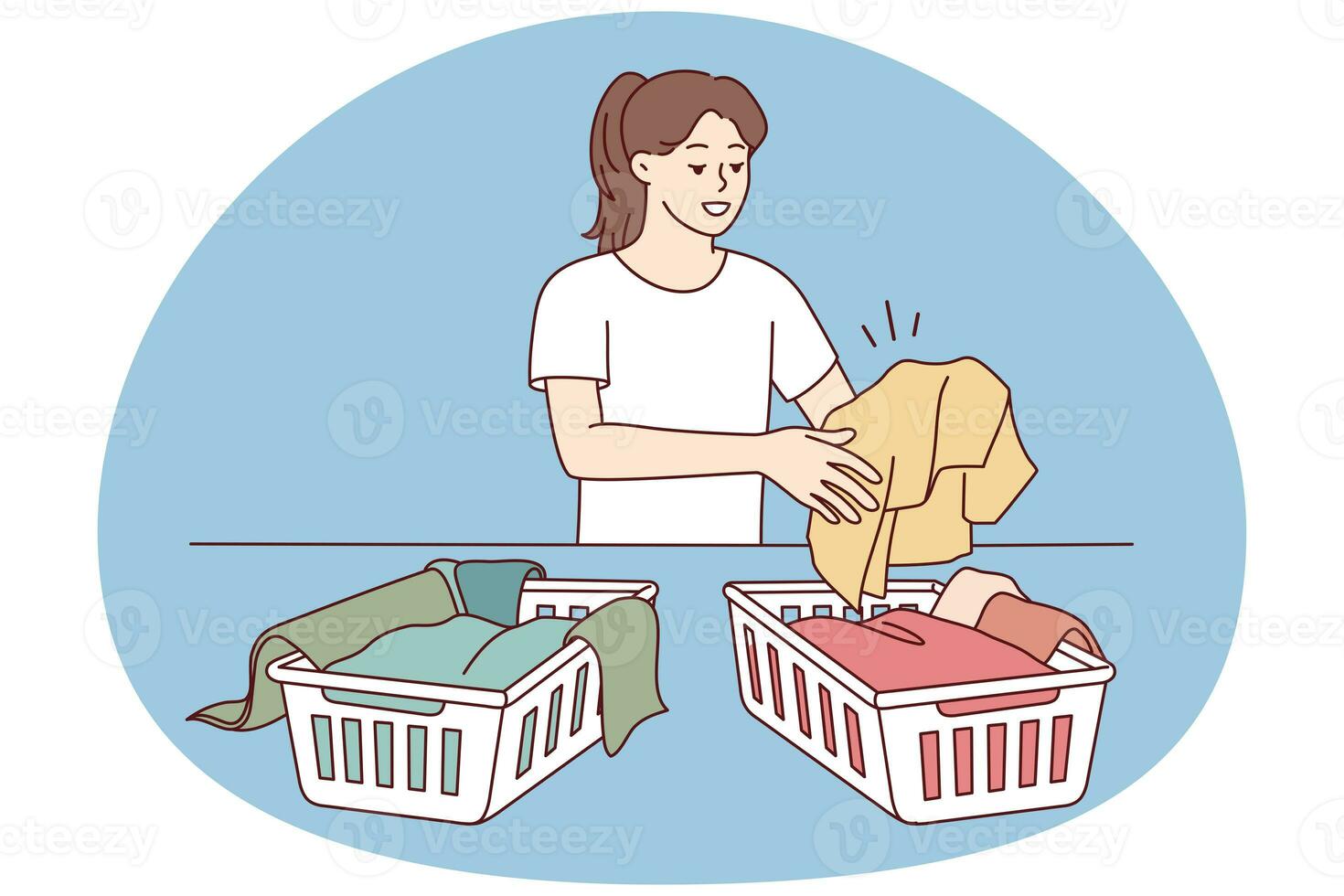 Woman sorting laundry in baskets photo