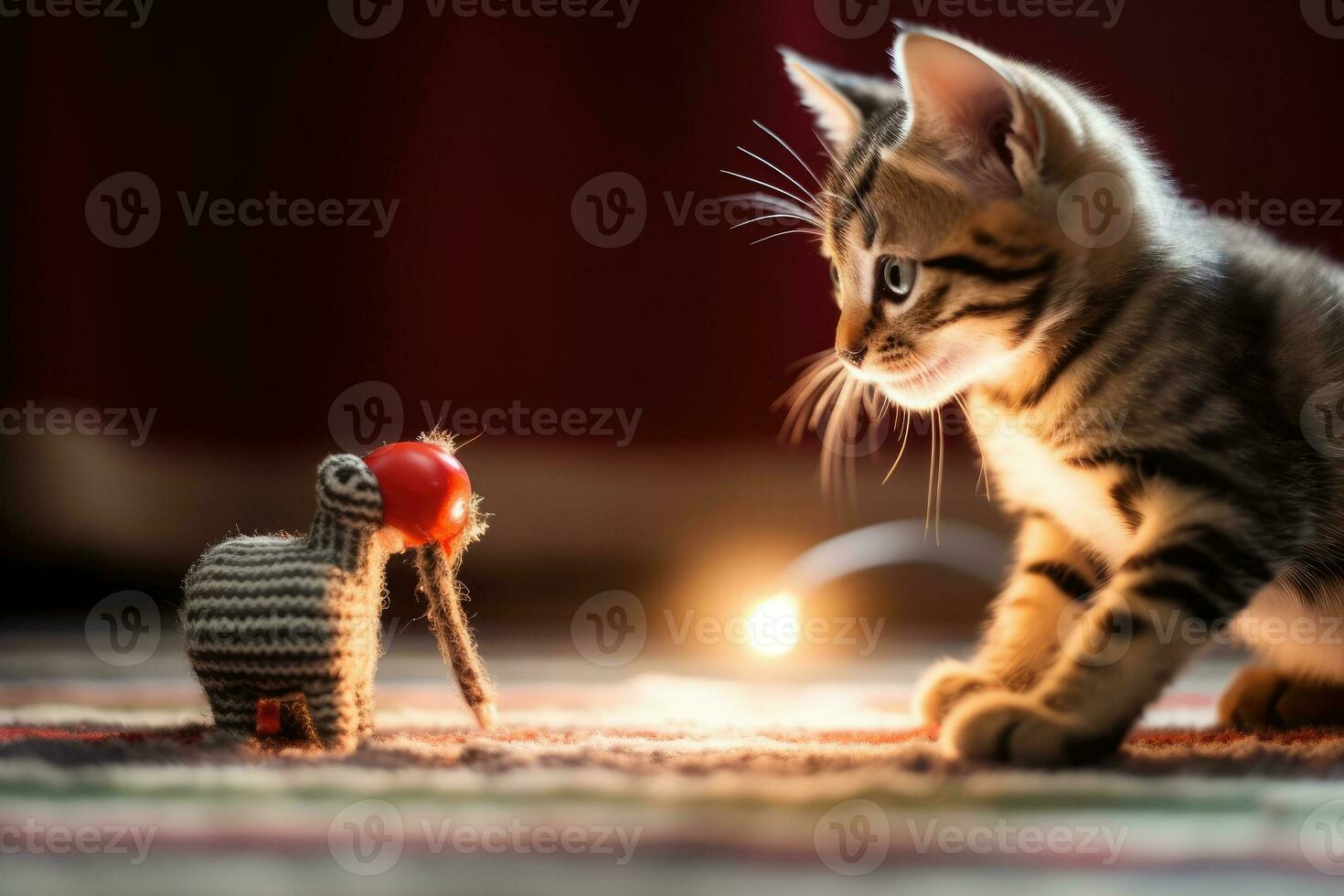 Curiosity Unleashed - A Playful Kitten's Encounter with a Toy Mouse - AI generated photo