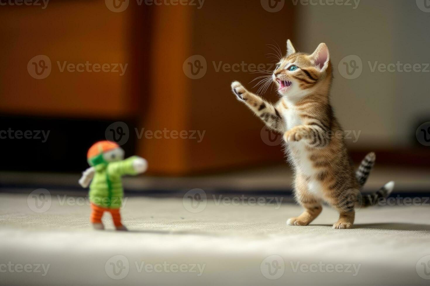 Feline Fun - A Kitten's Playful Pursuit of a Toy Mouse - AI generated photo