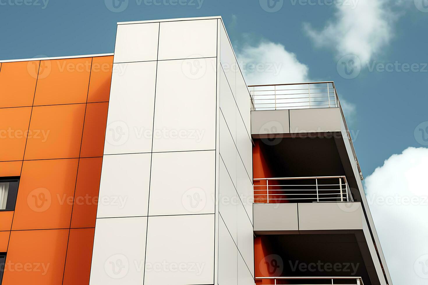 Low angle view of a modern white and orange building under the bright sky, AI Generative photo