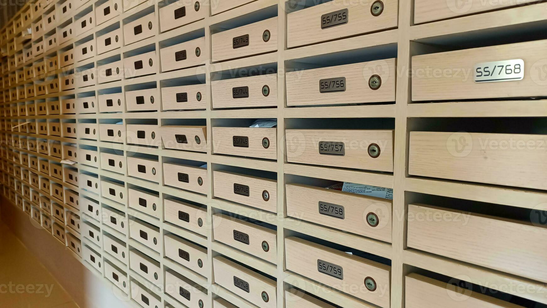 Wooden mailbox apartment and condominium photo