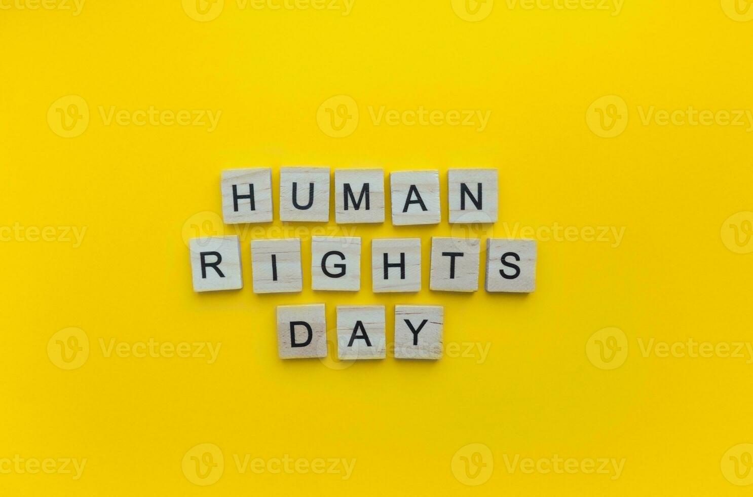 December 10, Human Rights Day, minimalistic banner with the inscription in wooden letters photo