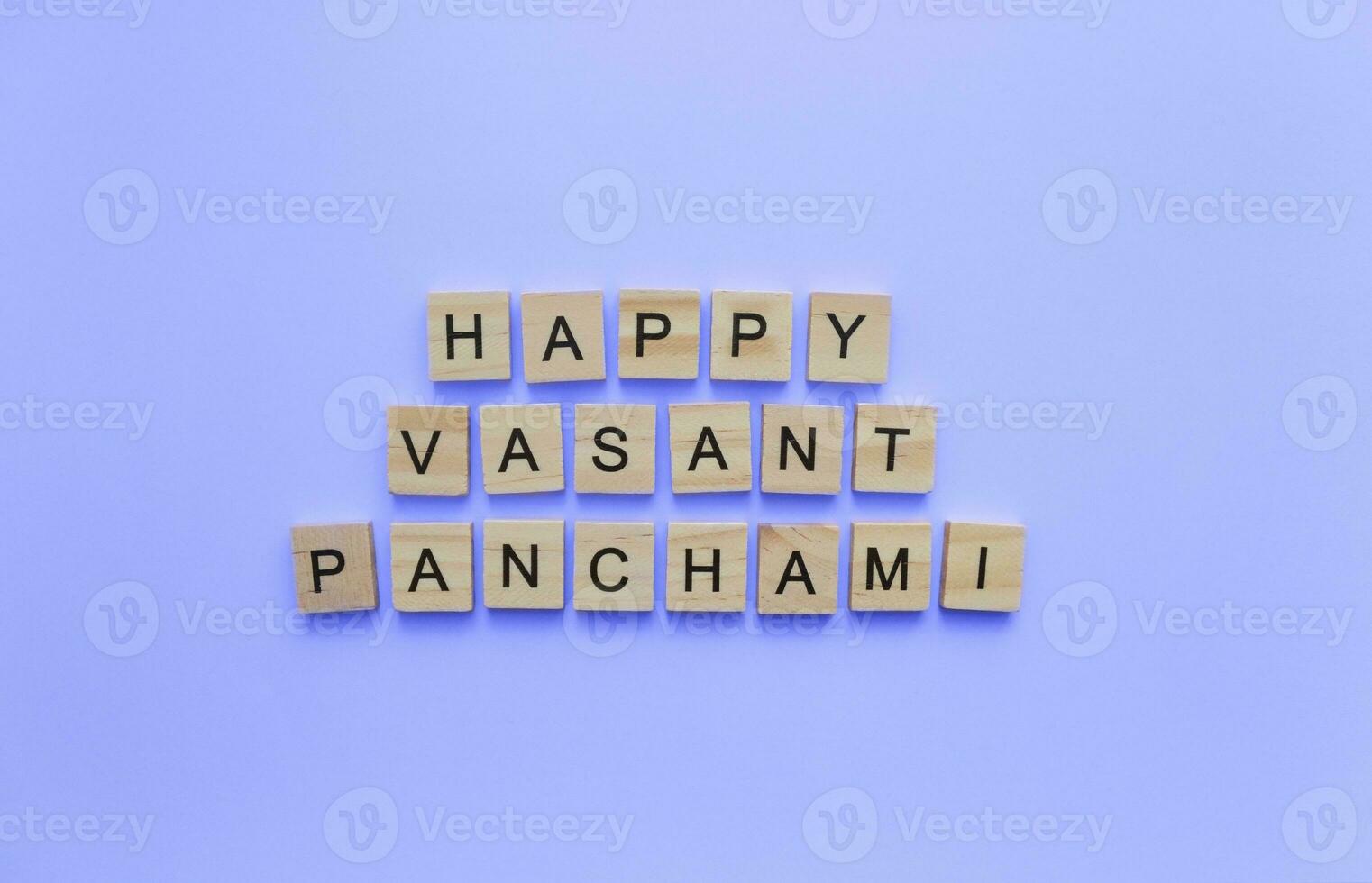 January 26, happy Vasant Panchami, a minimalistic banner with an inscription in wooden letters photo