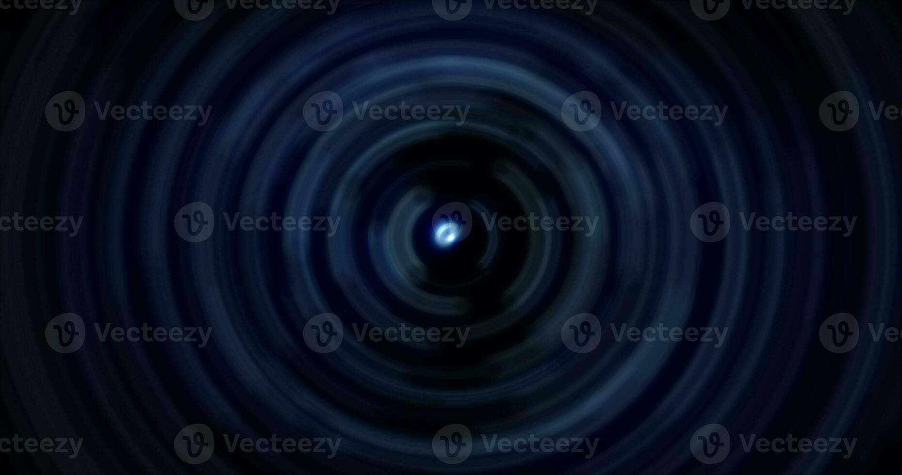 Abstract background of bright blue glowing energy magic radial circles of spiral tunnels made of lines photo