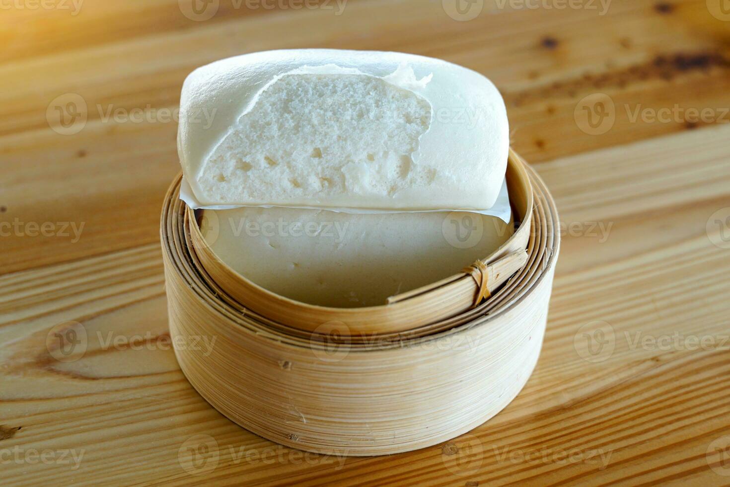 Mantou is a steamed dough dessert that is white and soft like a steamed bun but has no filling inside. It is a dessert offered during Chinese New Year and auspicious festivals, meaning luck. photo