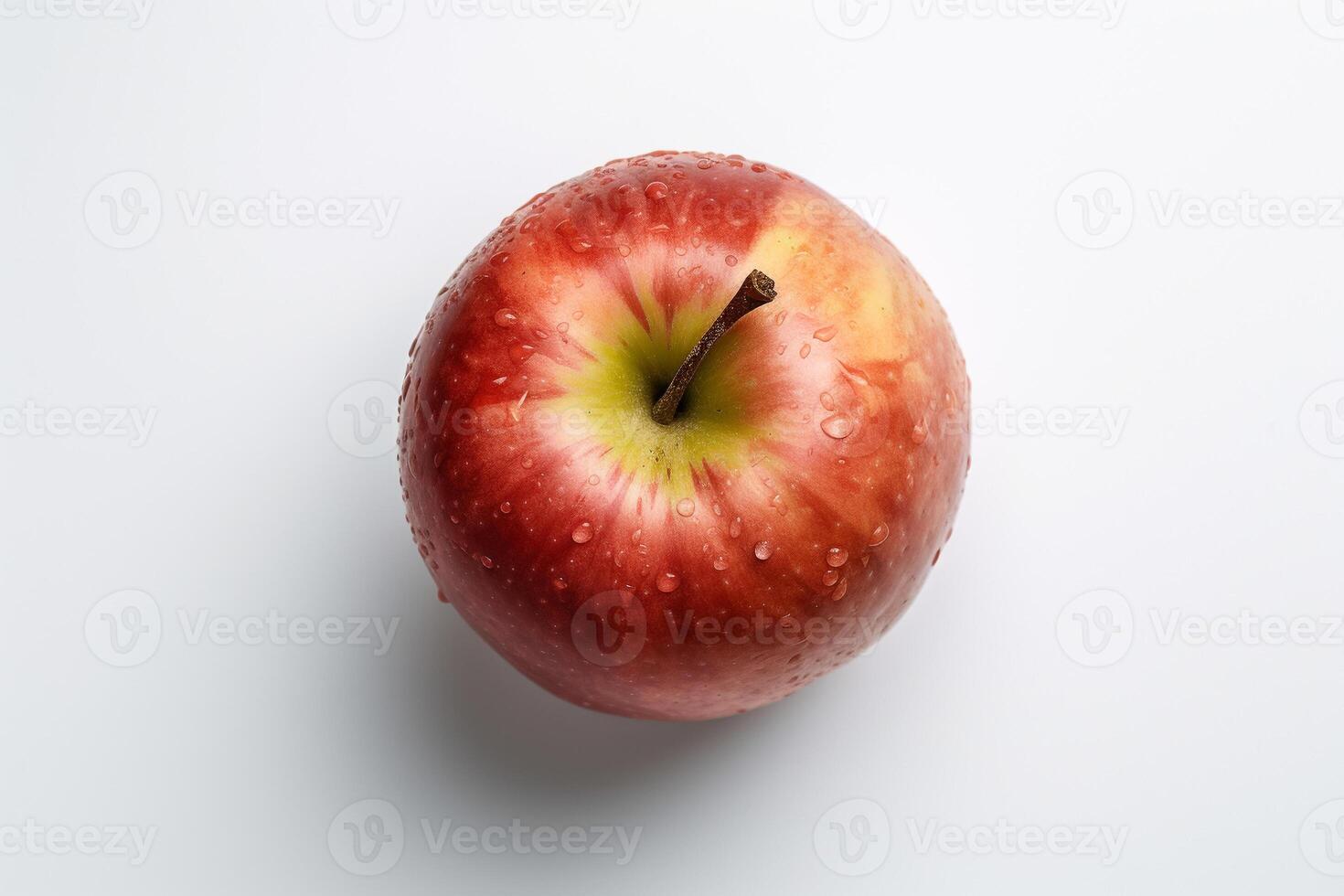A red apple with water droplets on it photo