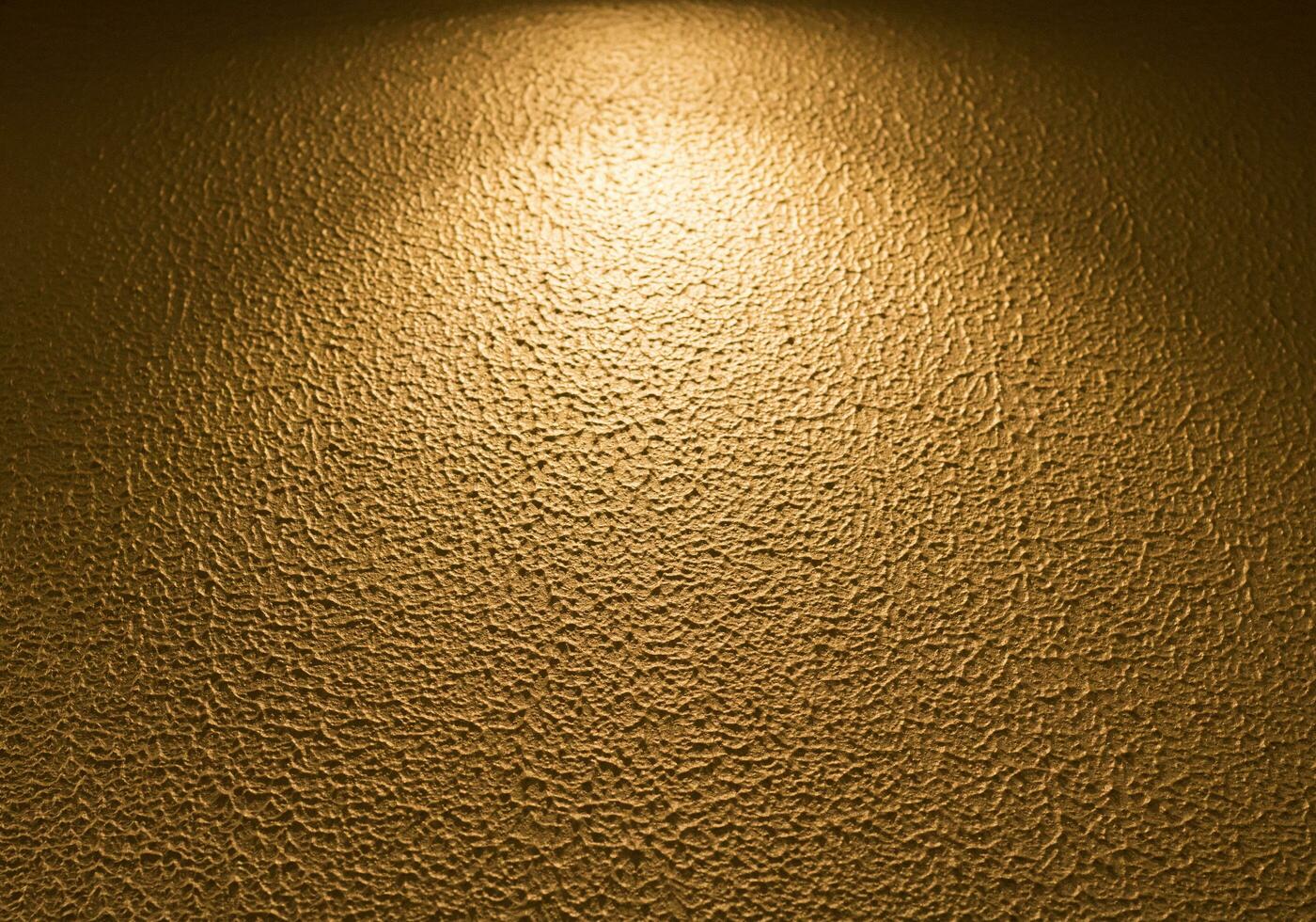 Shiny metallic bronze foil texture background, Gold foil background photo
