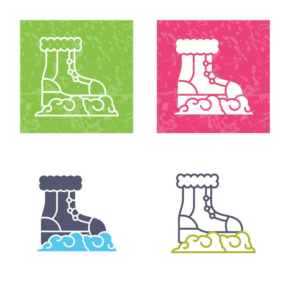 icono de vector de botas de nieve