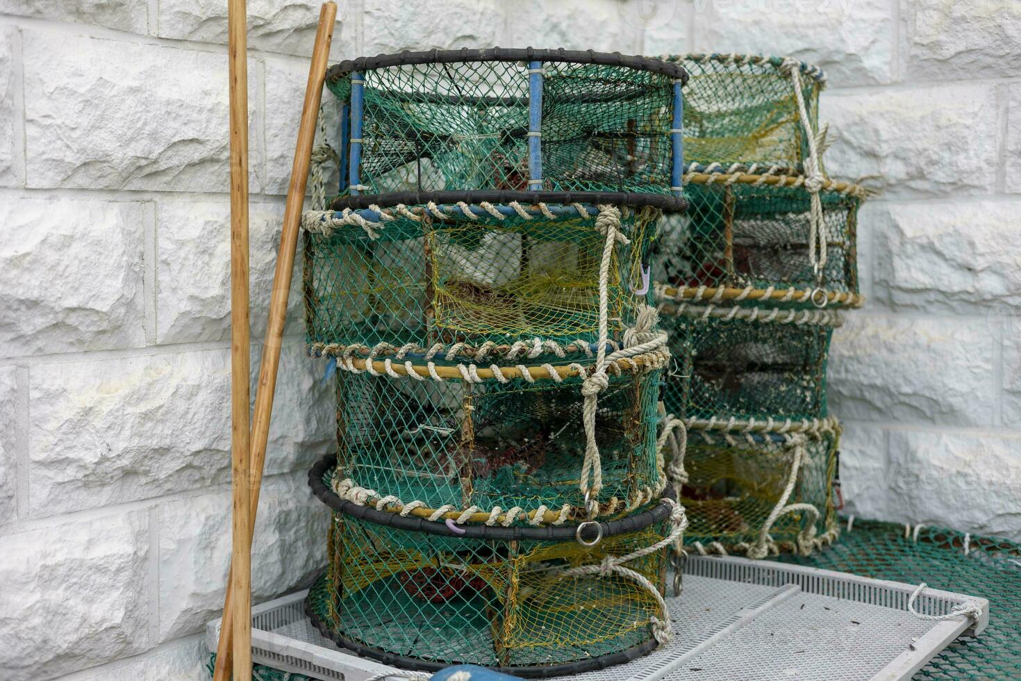 A sea port town piled with fishing nets, fishery-related tools 33166325  Stock Photo at Vecteezy