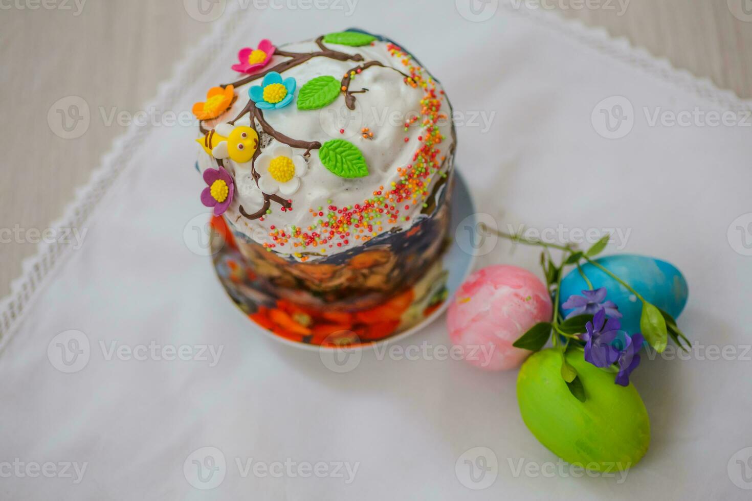 Easter cake with eggs and a flower vinca. Easter background. Self-baked Easter cake. Orthodox Traditions and Holidays photo