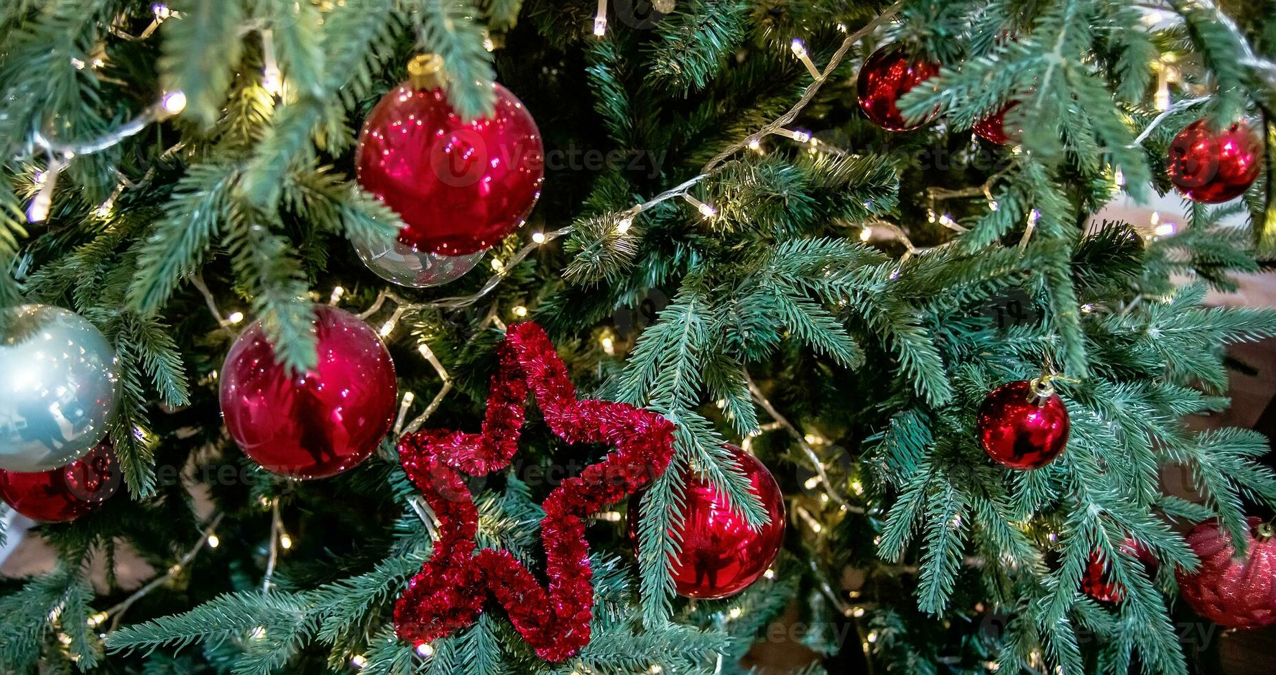 Christmas lights. Boke of blue and yellow spots. Defocused Image Of Illuminated christmas tree. Copyspace photo