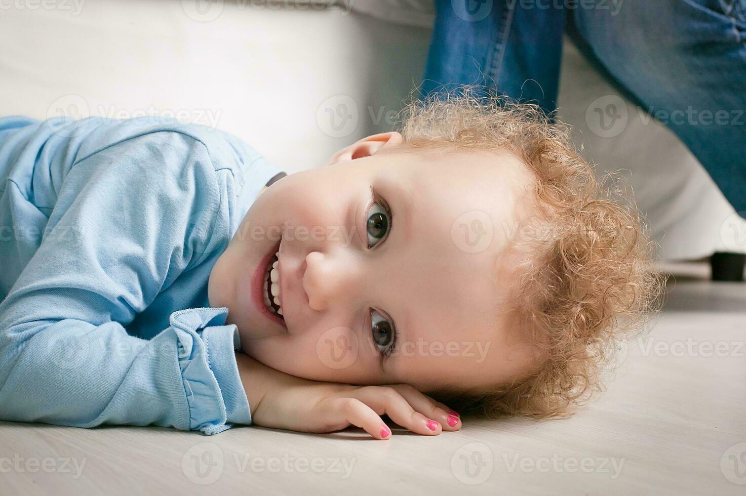 Child Lying Stock Photos, Images and Backgrounds for Free Download
