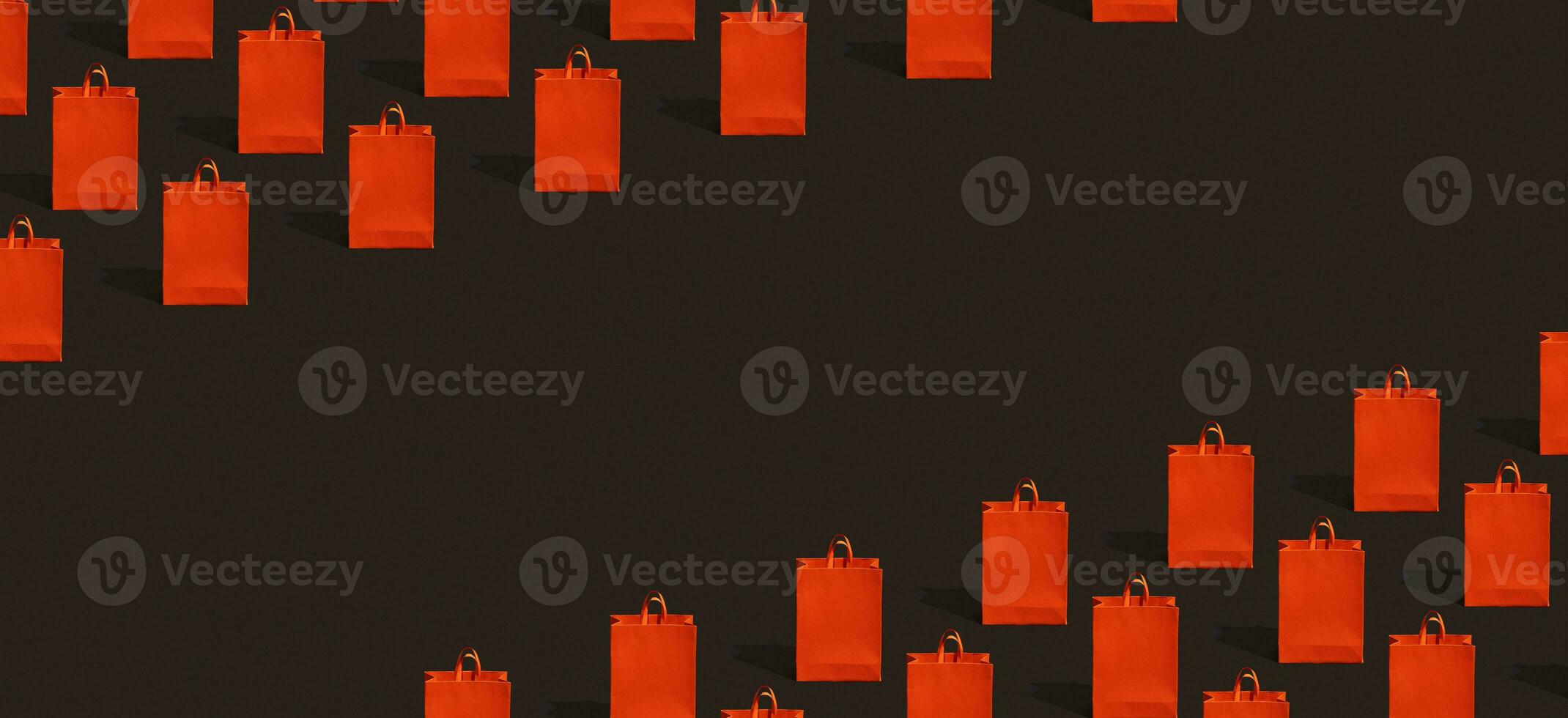 Black friday sale, shopping concept. Red paper shopping bag pattern on black background. photo