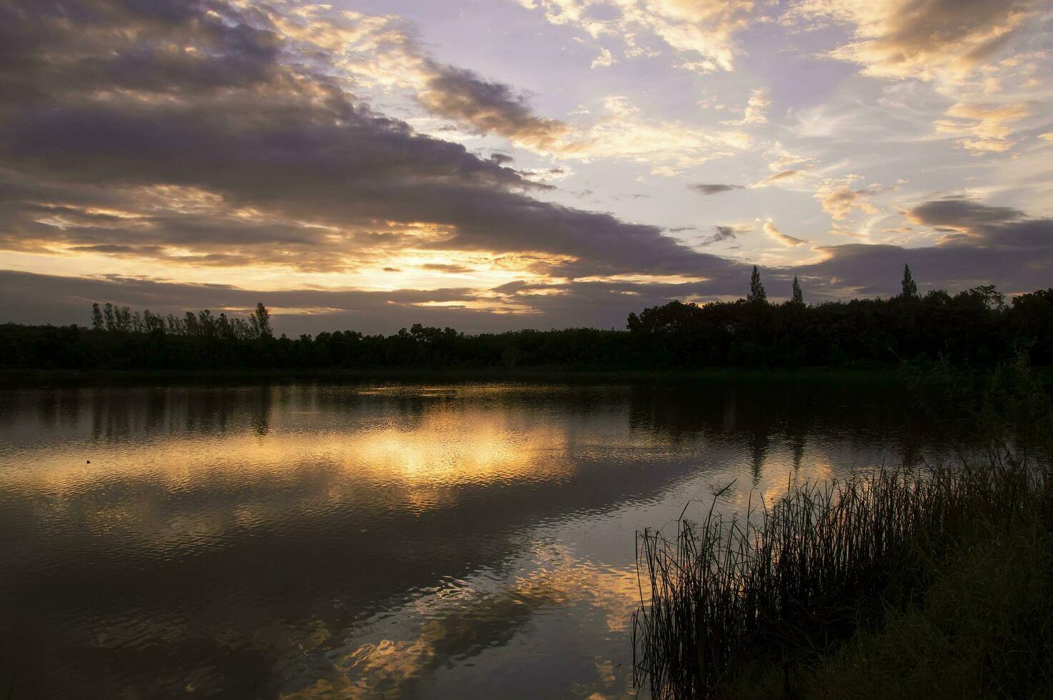a lake with a church in the background photo
