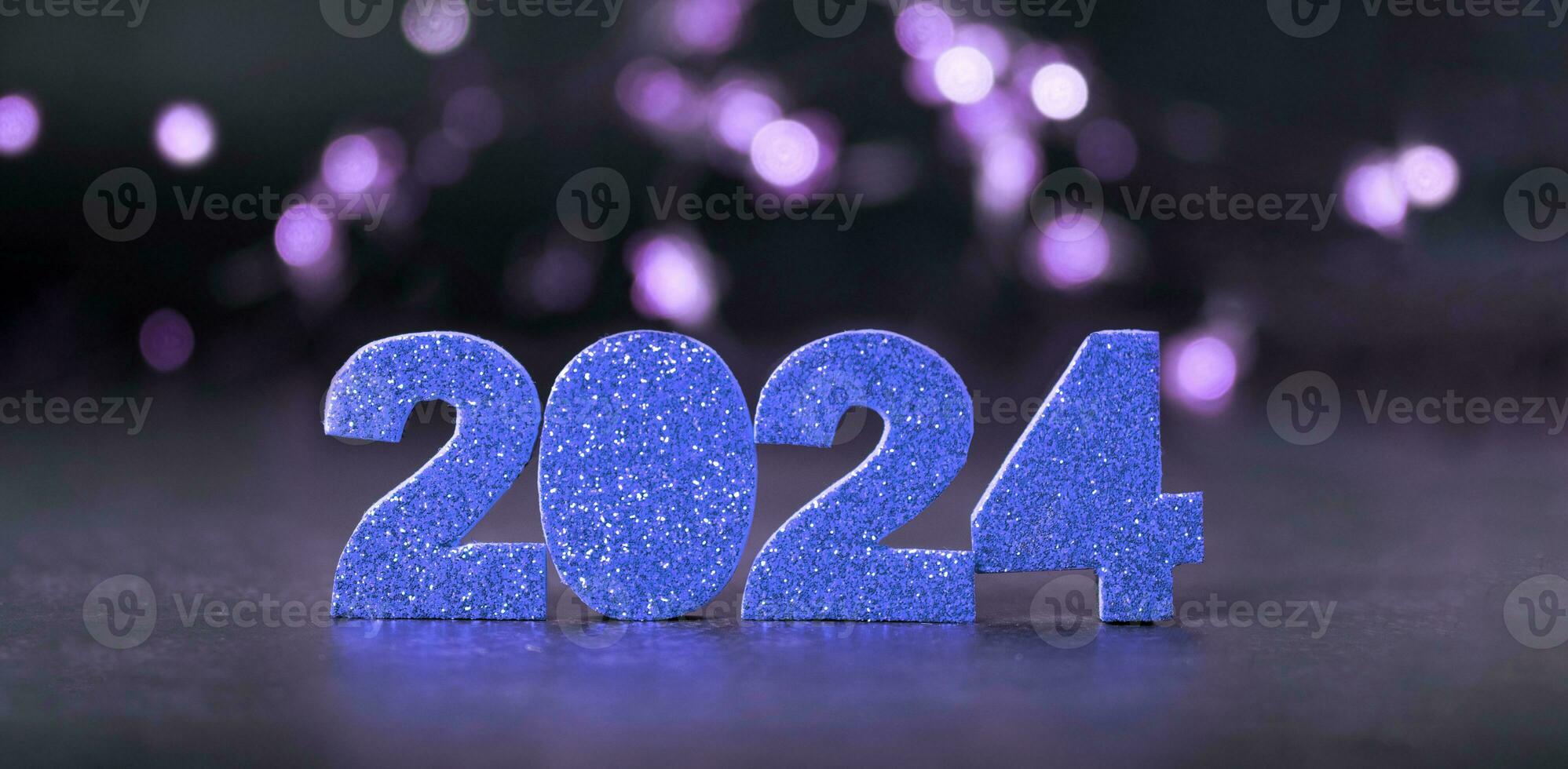 2024 Brillantina azul números con bokeh bandera antecedentes. contento nuevo año 2024 concepto foto