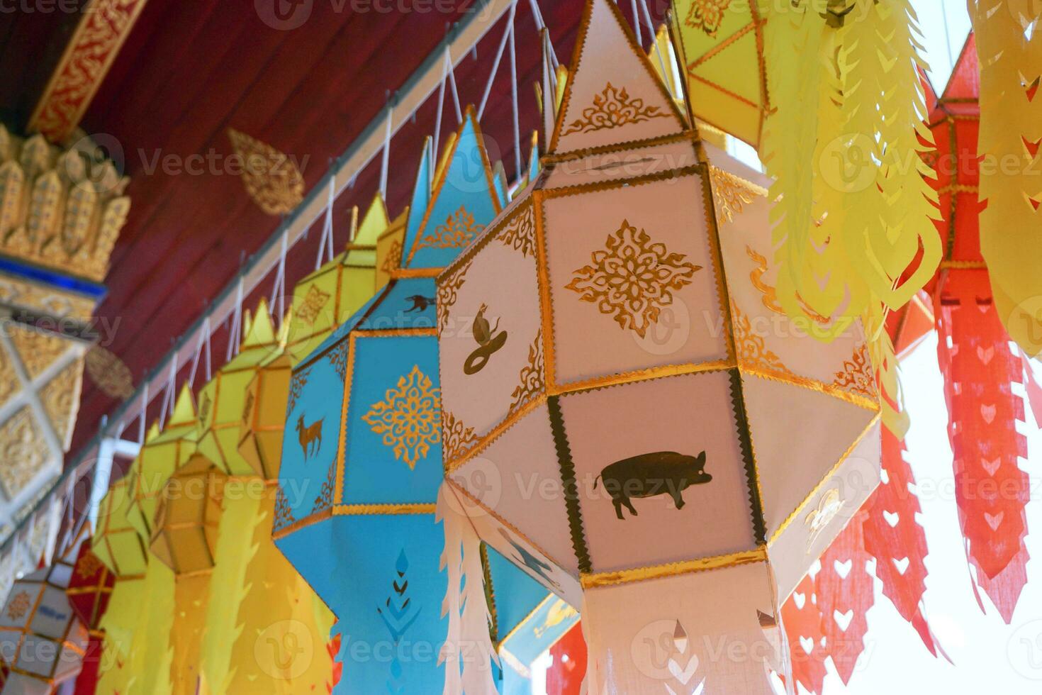 Closeup Thai Lanna style lanterns to hang in front of the temple in hundred thousand lanterns festival, Lumphun, Thailand. photo