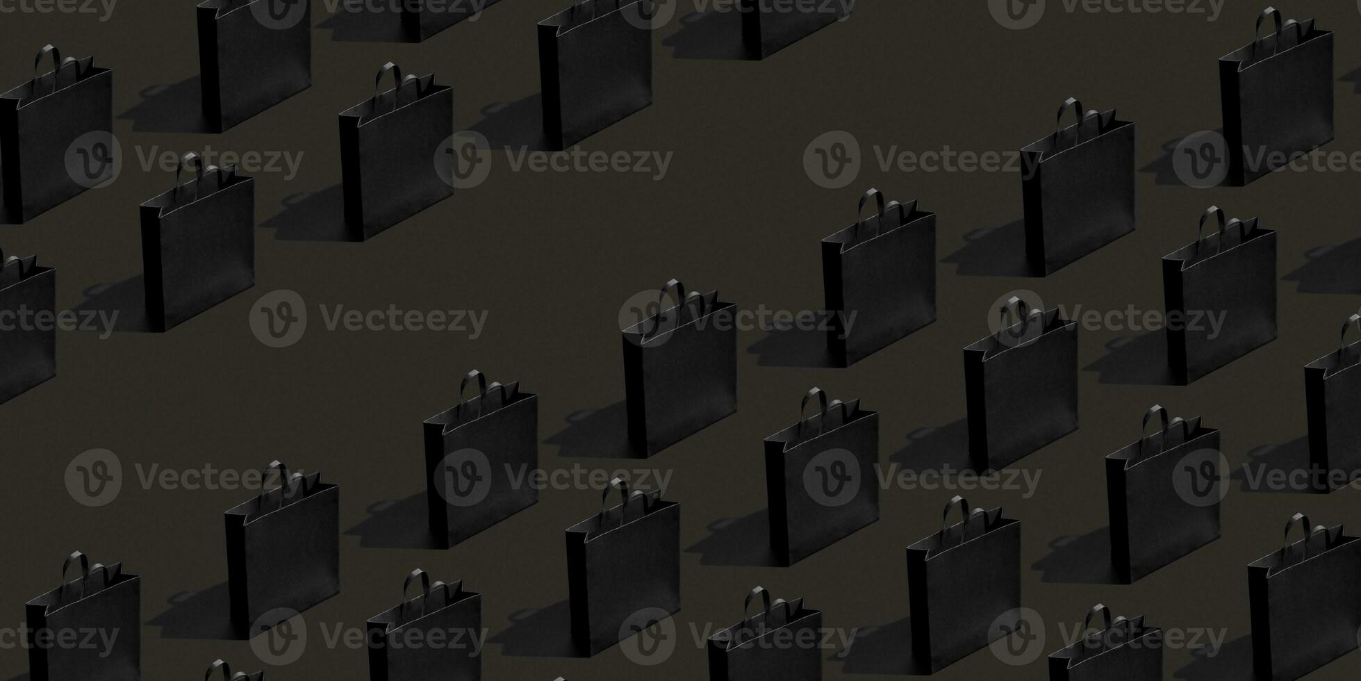 Pattern made from black paper shopping bags on black background. Black friday banner sale, shopping concept. photo