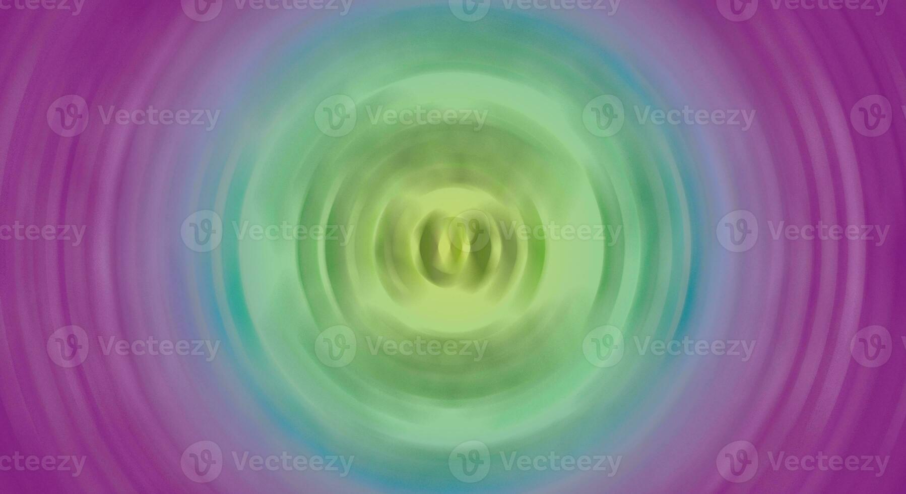 a purple and green circular image with a circular center, abstract background with bokeh defocused lights and shadow. photo