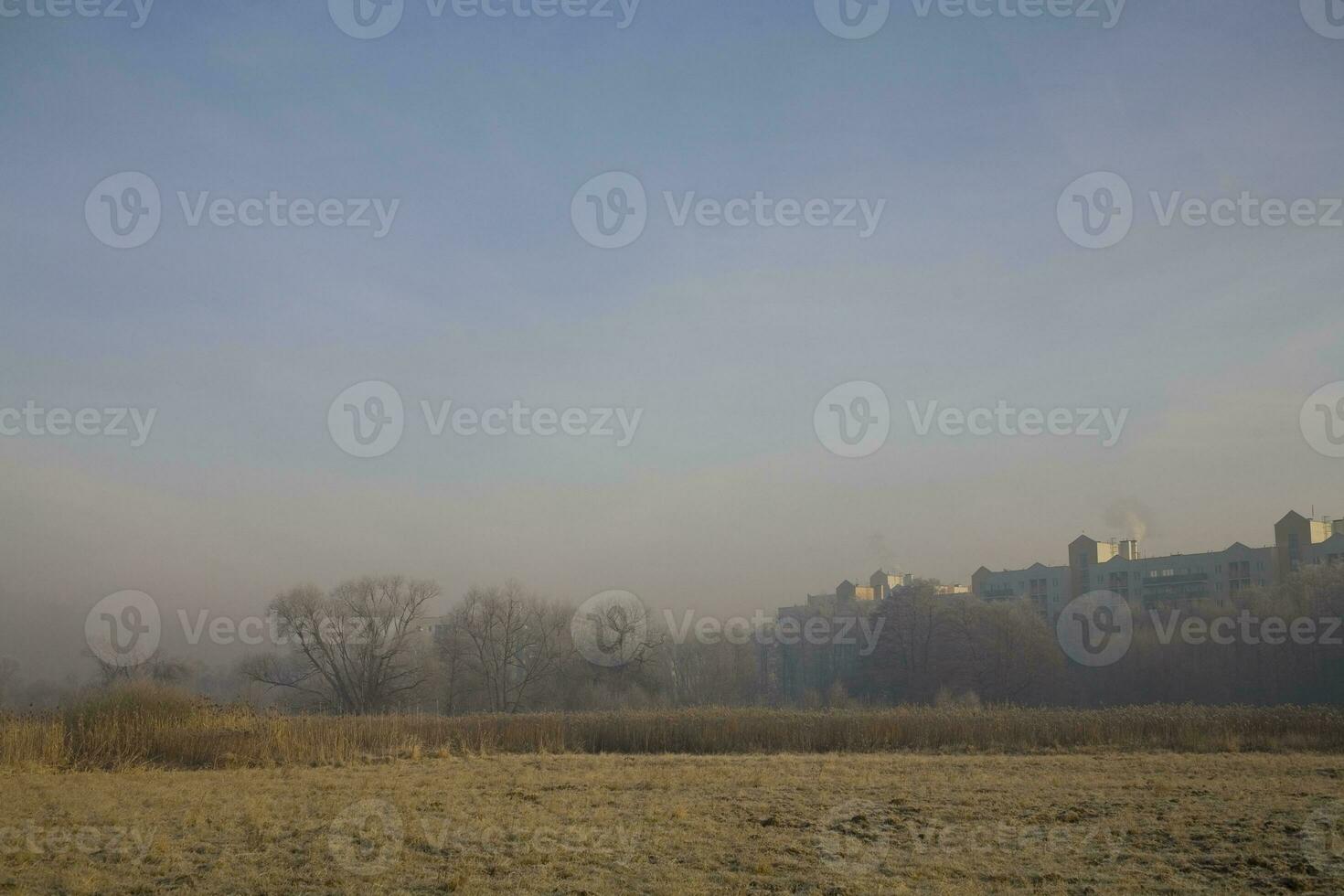 winter cloudless morning on the outskirts of a big city photo