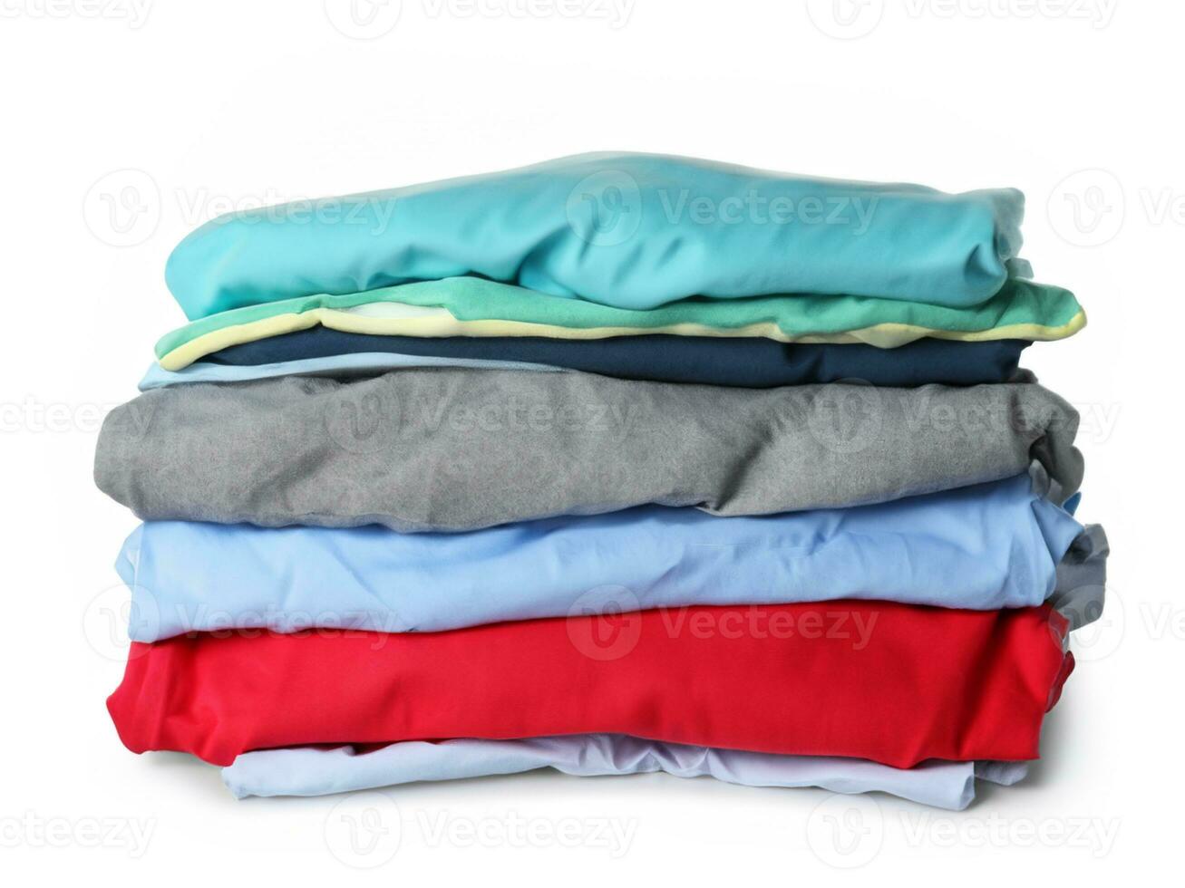 Stack of dirty clothes on white background photo