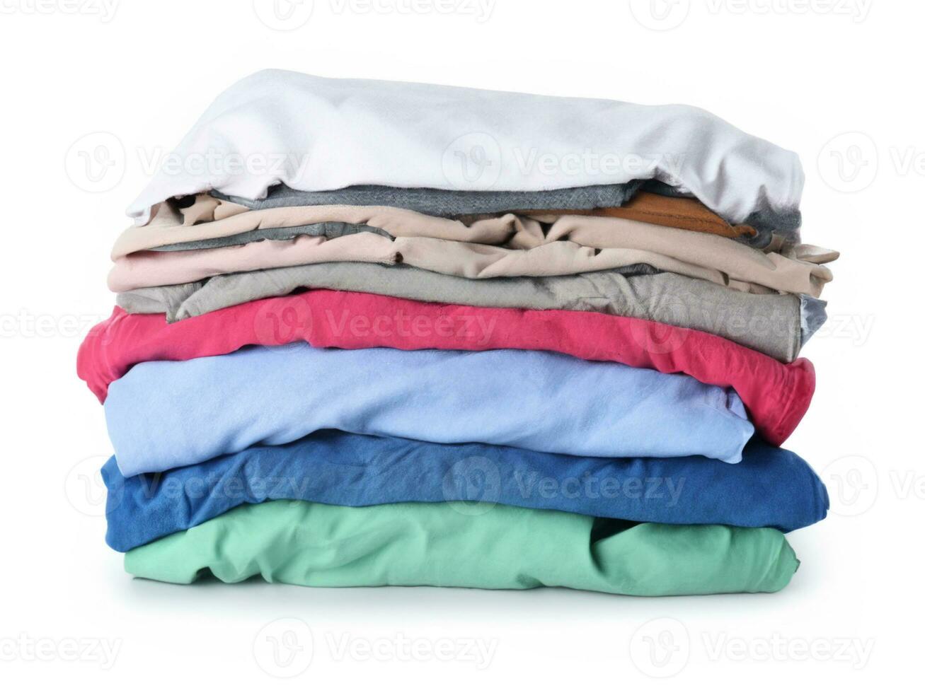 Stack of dirty clothes on white background photo