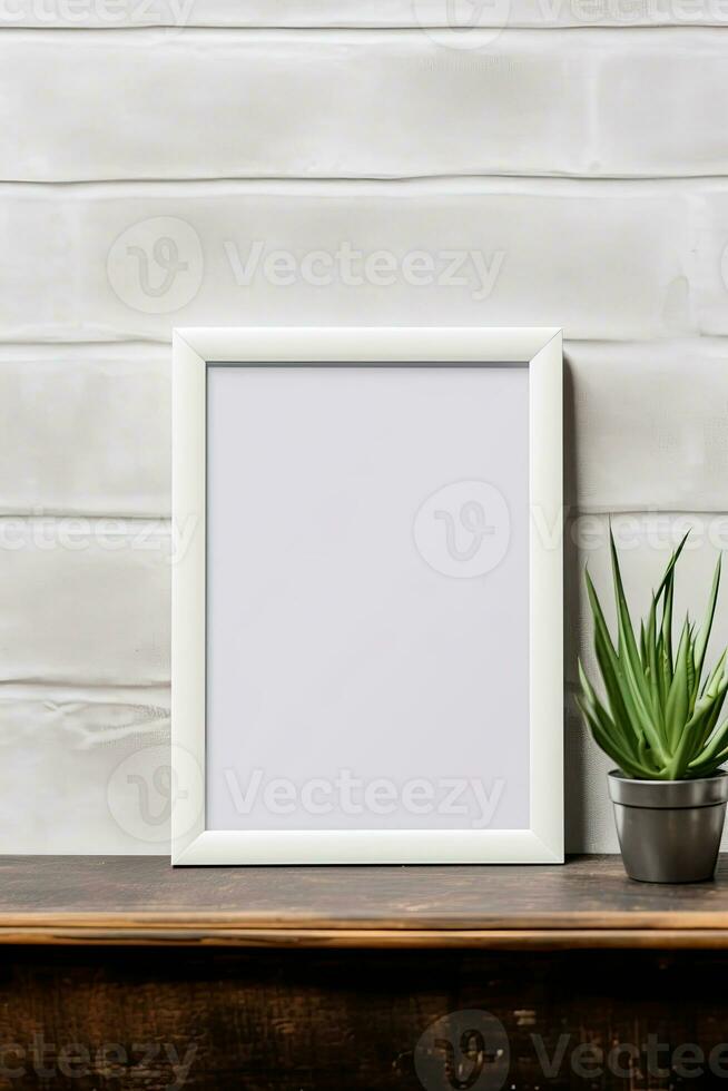 Empty vertical picture frame mockup hanging on a brick wall with wooden desk table and flower vase AI Generated photo