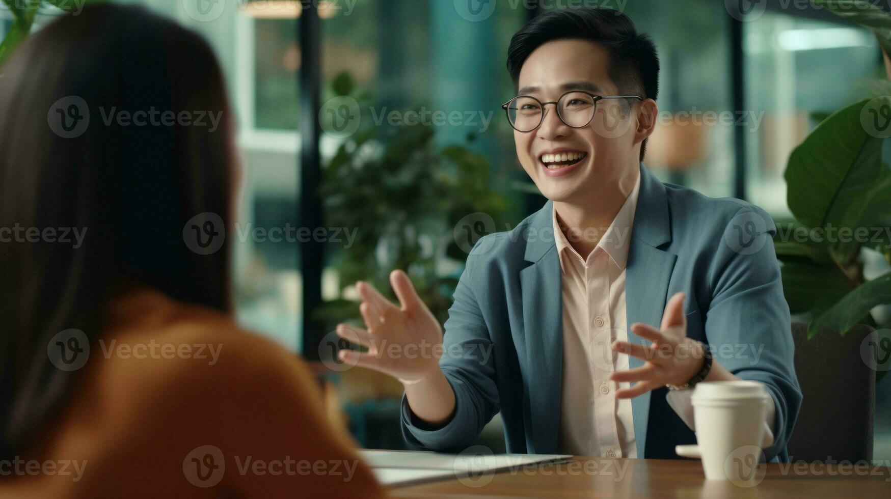 Asian businessman wearing glasses, smiling and waving at his colleague AI Generated photo