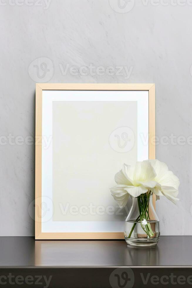Blank vertical picture frame mockup hanging on a plain wall with wooden desk table and flower vase AI Generated photo